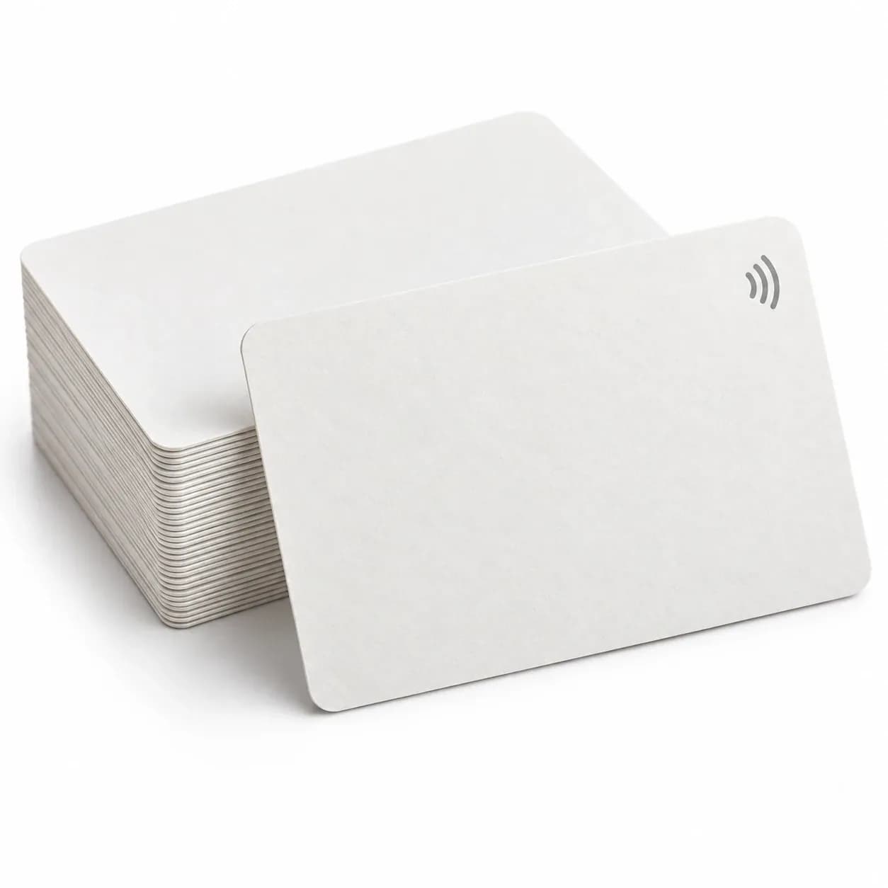 Stack of white paper RFID key cards with the contactless symbol